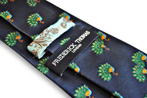 navy tie with peacock (fanned tail) design