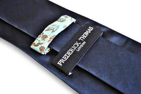 navy tie with herringbone design
