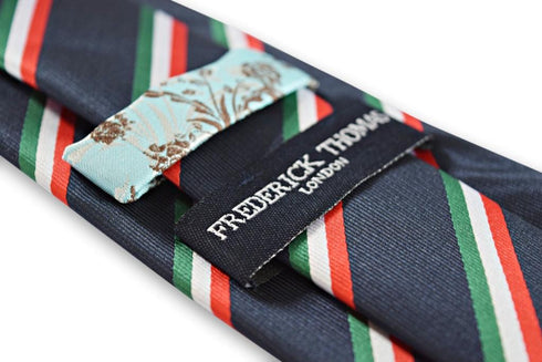 navy tie with red, green and white stripe design