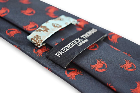 navy tie with crab design