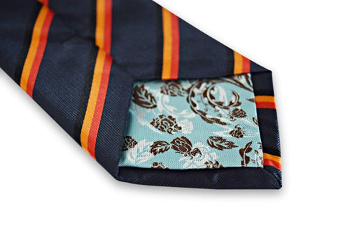 navy tie with red, black and orange stripe design