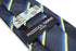 navy tie with royal blue and yellow gold stripe design