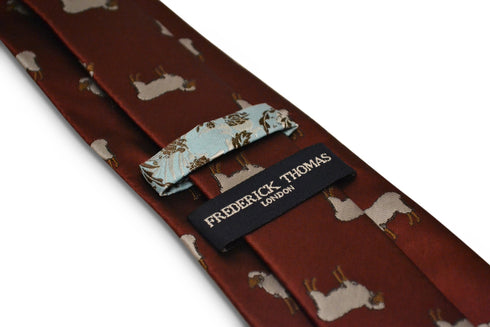 maroon tie with sheep embroidered design