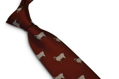 maroon tie with sheep embroidered design