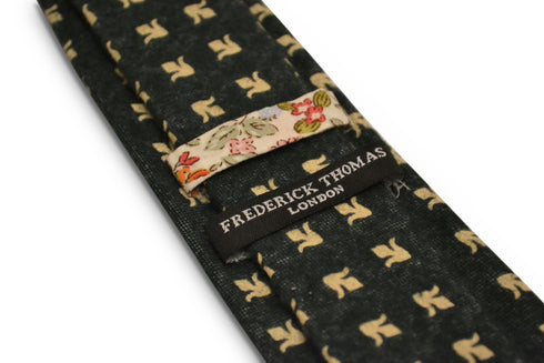 dark grey blue with gold fleur de lis design slim wool tie