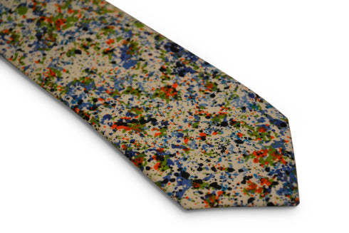 white with blue and green paint splatter design cotton tie