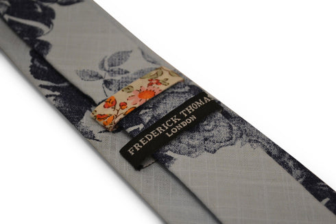 light baby blue with navy blue floral stencil design cotton tie