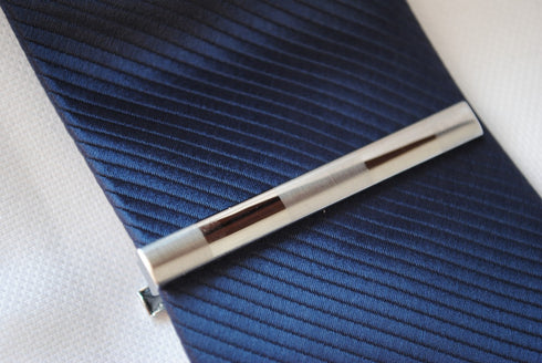 silver tie clip with three stripes
