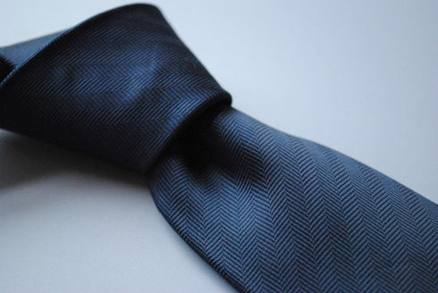 plain navy blue herringbone tie