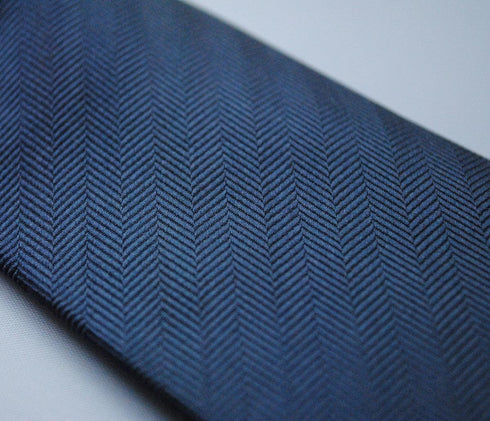 plain navy blue herringbone tie