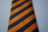 orange & navy blue striped tie