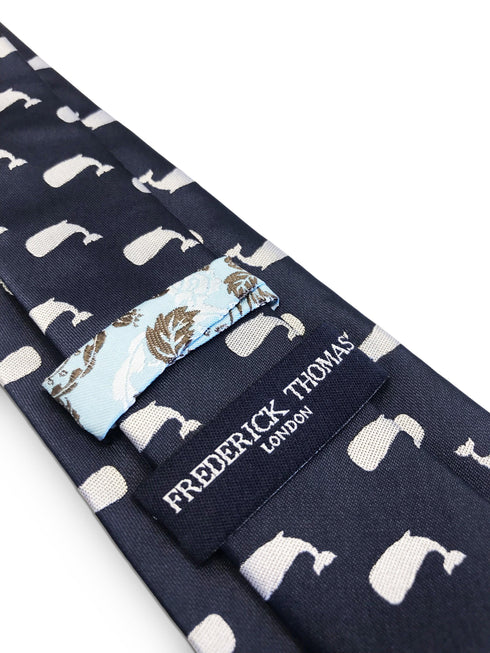 navy blue tie with whale print design