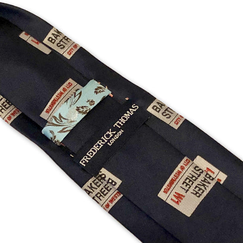 navy blue tie with sherlock holmes baker street print design