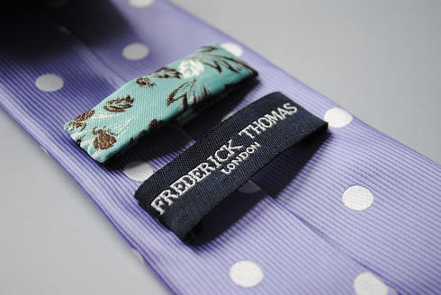 lavender purple tie with white polka dots