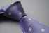 lavender purple tie with white polka dots