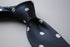 navy blue tie with white polka dots