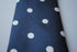 navy blue tie with white polka dots