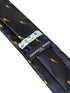 navy blue tie with saxophone embroidered design