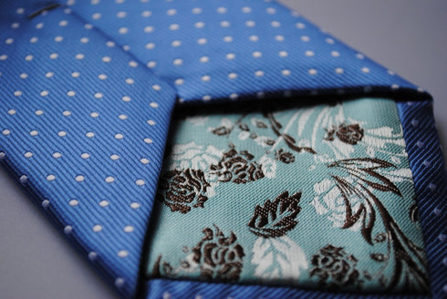 medium blue tie with white polka dots