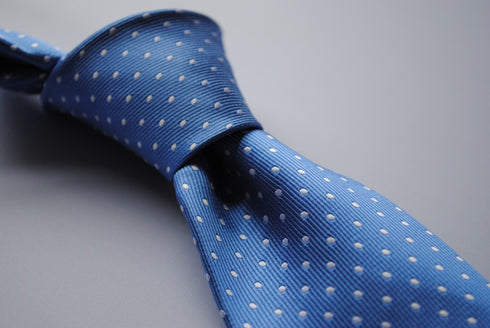 medium blue tie with white polka dots
