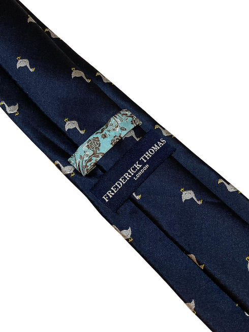 navy blue tie with white goose embroidered design