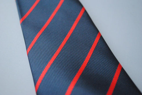 navy blue tie with thin red stripes