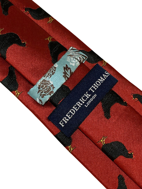 red tie with black chicken embroidered design