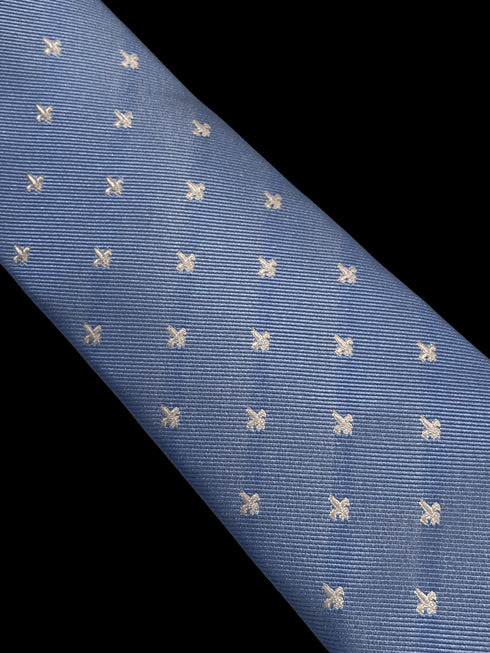 light blue tie with fleur de lis pattern
