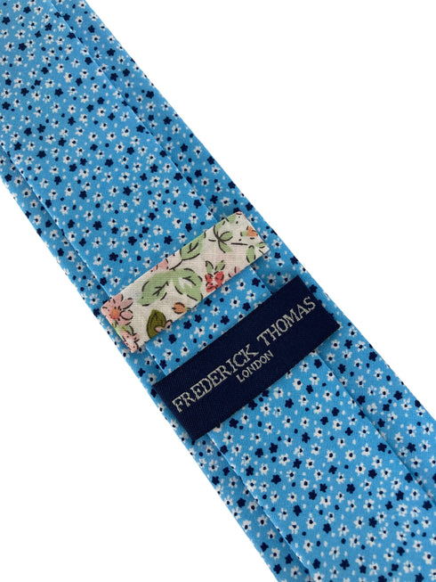 light pastel baby blue cotton tie with ditsy navy & white floral print