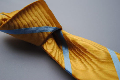yellow tie with blue club stripe