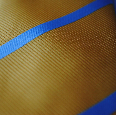 yellow tie with blue club stripe