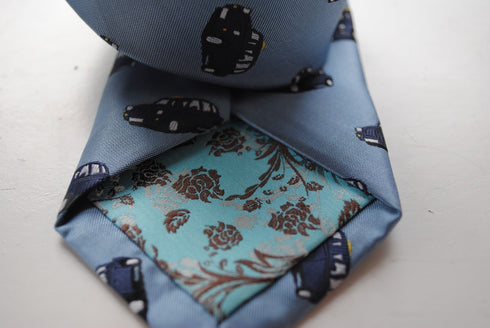 light blue tie with black london taxi cab pattern