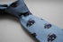 light blue tie with black london taxi cab pattern