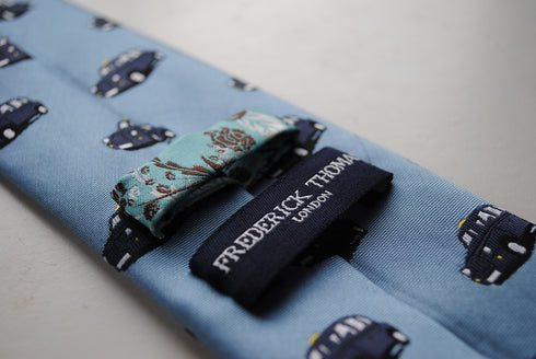 light blue tie with black london taxi cab pattern