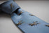 light blue tie with lancaster bomber pattern