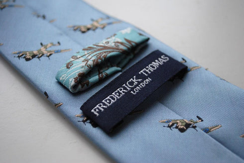 light blue tie with lancaster bomber pattern