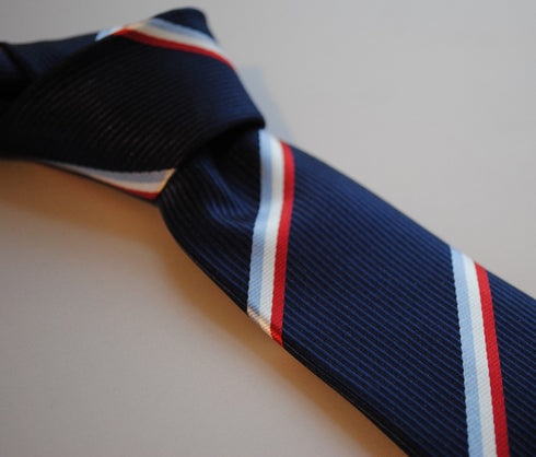 navy, red, white and light blue striped tie