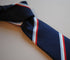 navy, red, white and light blue striped tie