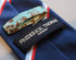 navy, red, white and light blue striped tie