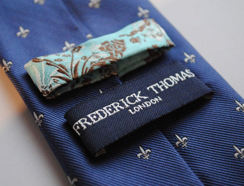 navy fleur de lis patterned tie