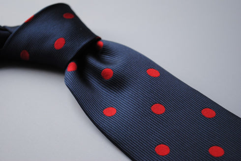 navy tie with red polka dots