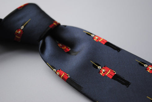 navy tie with royal queens guards pattern