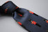 navy tie with royal queens guards pattern