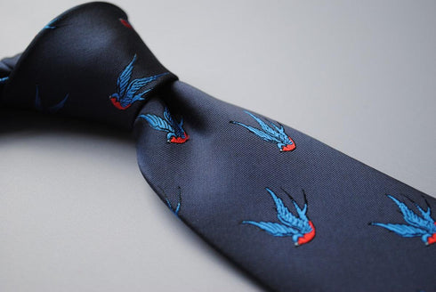 navy tie with swallow bird pattern