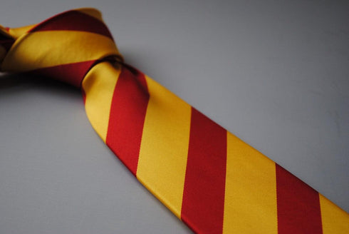 yellow and red barber striped tie