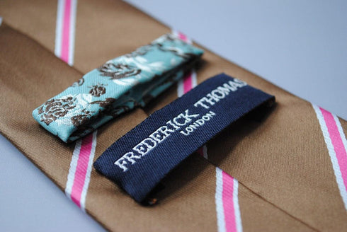 brown, white and pink striped tie