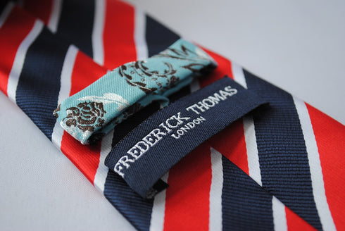 navy tie with red and white stripes