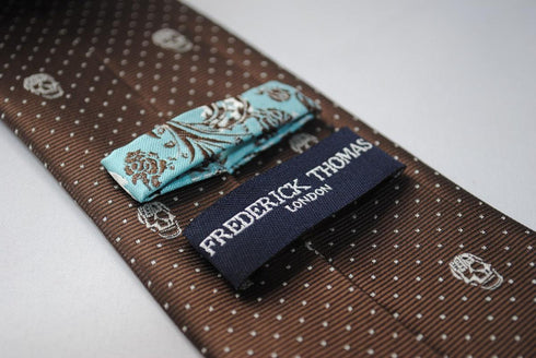 brown skulls design tie