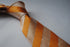 burnt orange and champagne striped tie