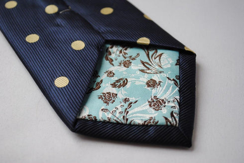 navy tie with yellow polka dots and signature floral reverse